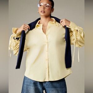 NWT Women's Slim Fit Bell Long Sleeve
Collared Button-Down Shirt - yellow
